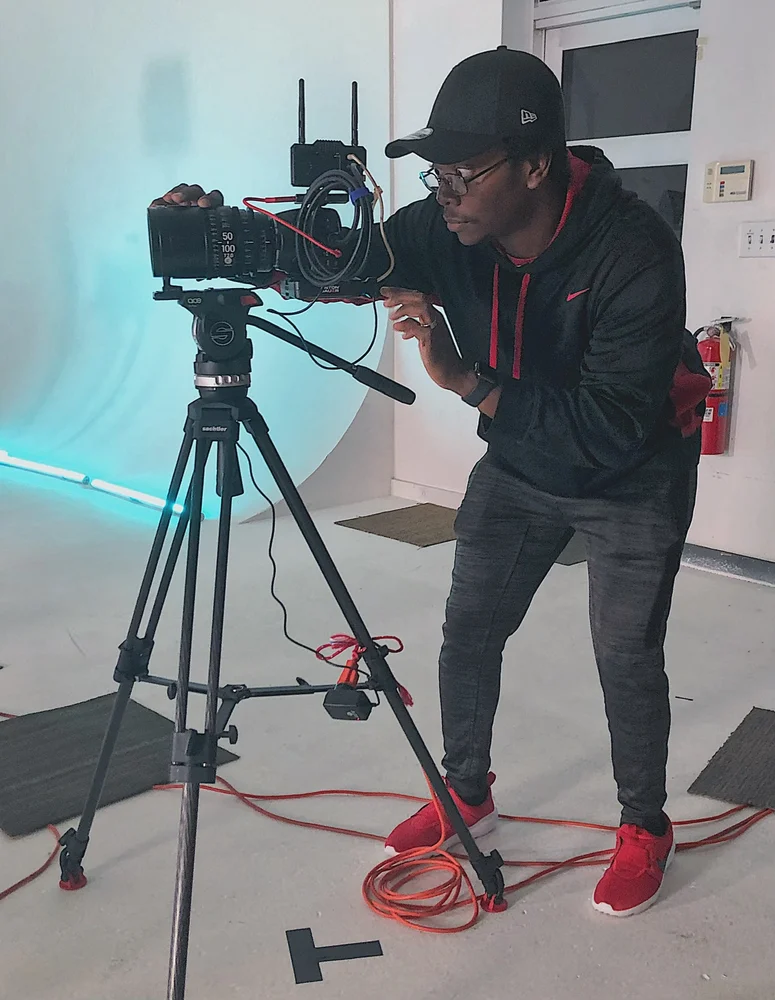 Rydrea Walker on a studio set with a cyc wall