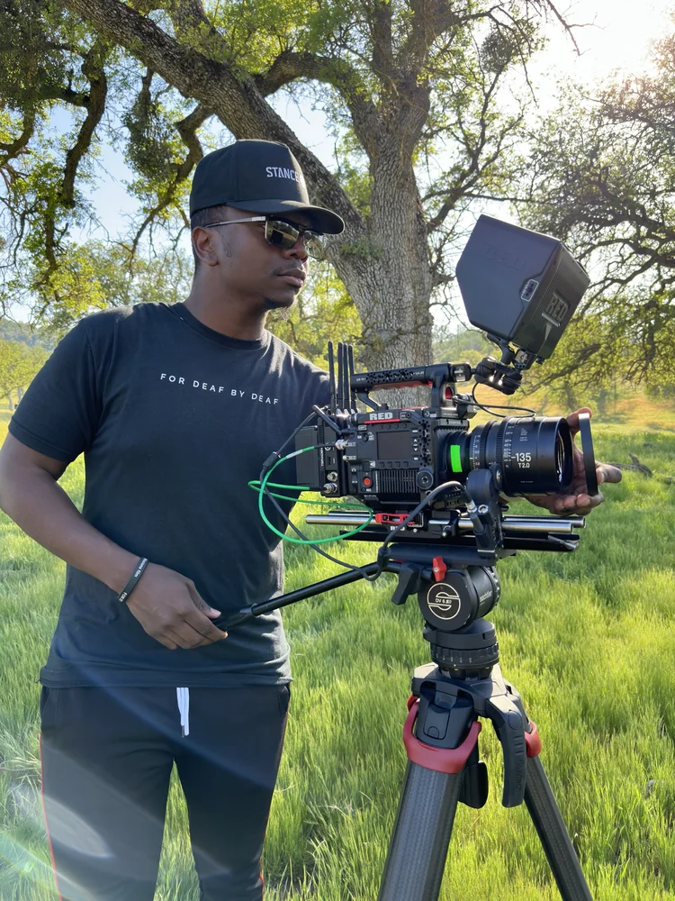 Rydrea Walker filming outdoors with a RED camera